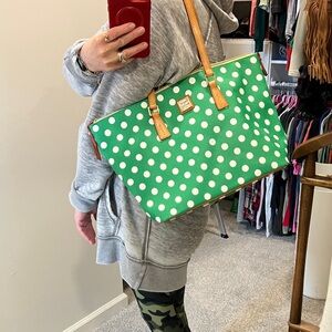 Dooney & Bourke green polka dot tote. Flaws inside bag.